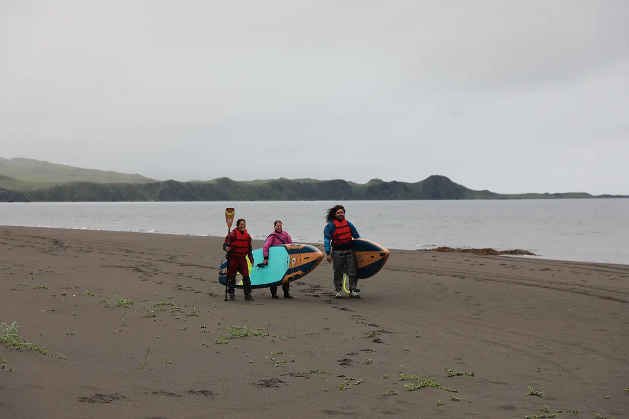 Group paddleboarding in Adak, Alaska.